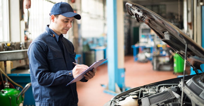 Mechanic writing an estimate